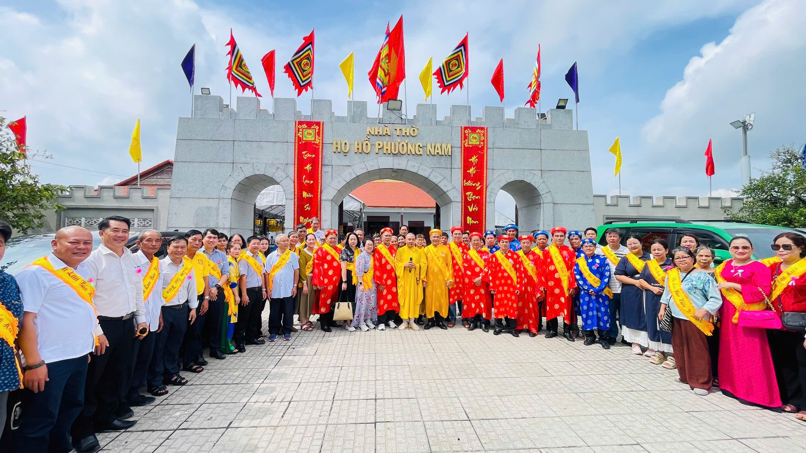 A group of people standing in front of a stone archway

AI-generated content may be incorrect.